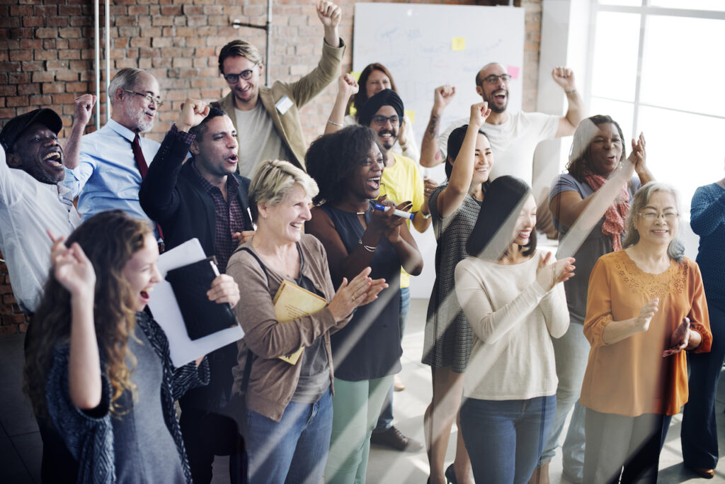 a group of people cheering